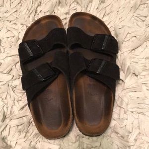 Black suede Birkenstock’s